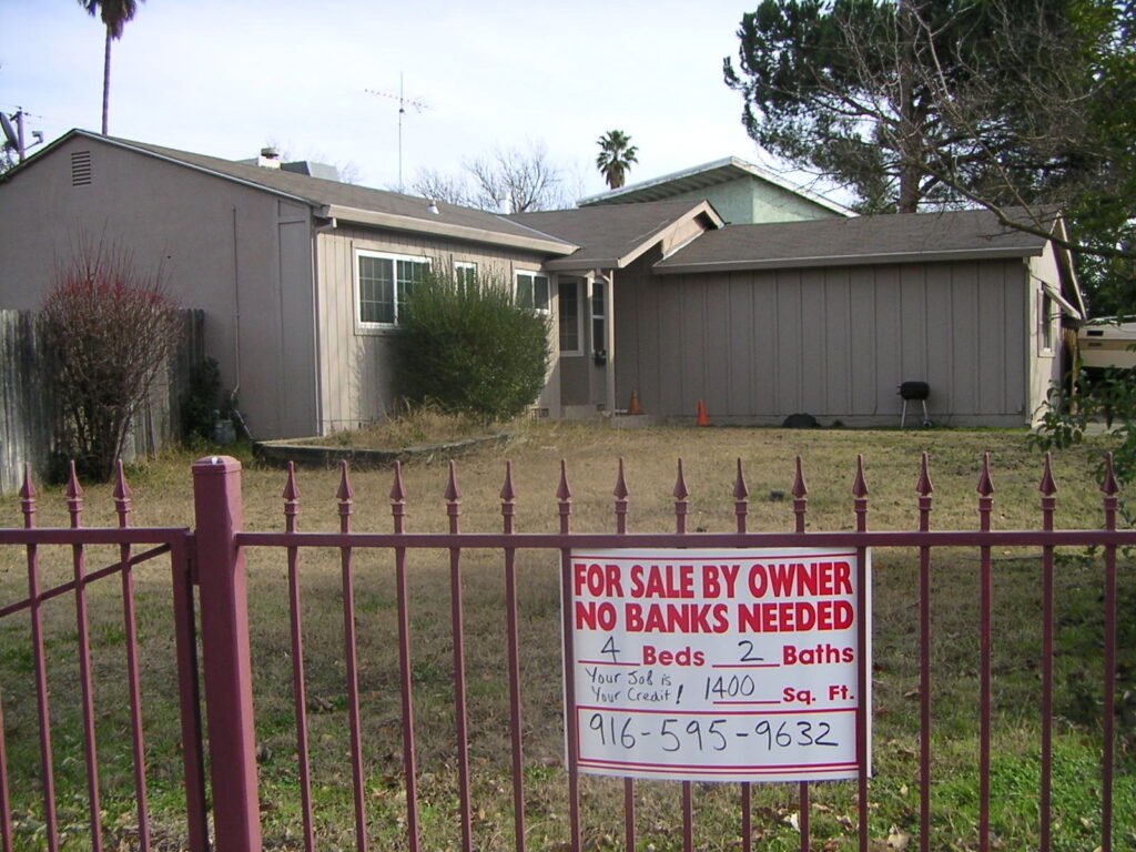 For sale sign outside a US home